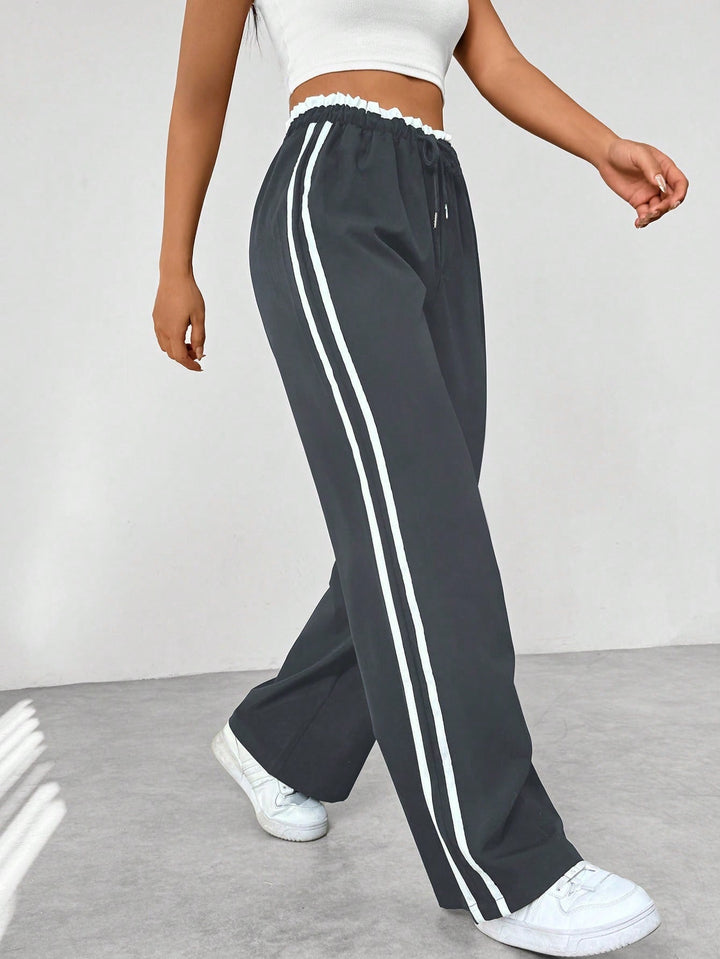 Damen High Waist Freizeithose mit Seitenstreifen und weitem Bein | Relaxed Fit