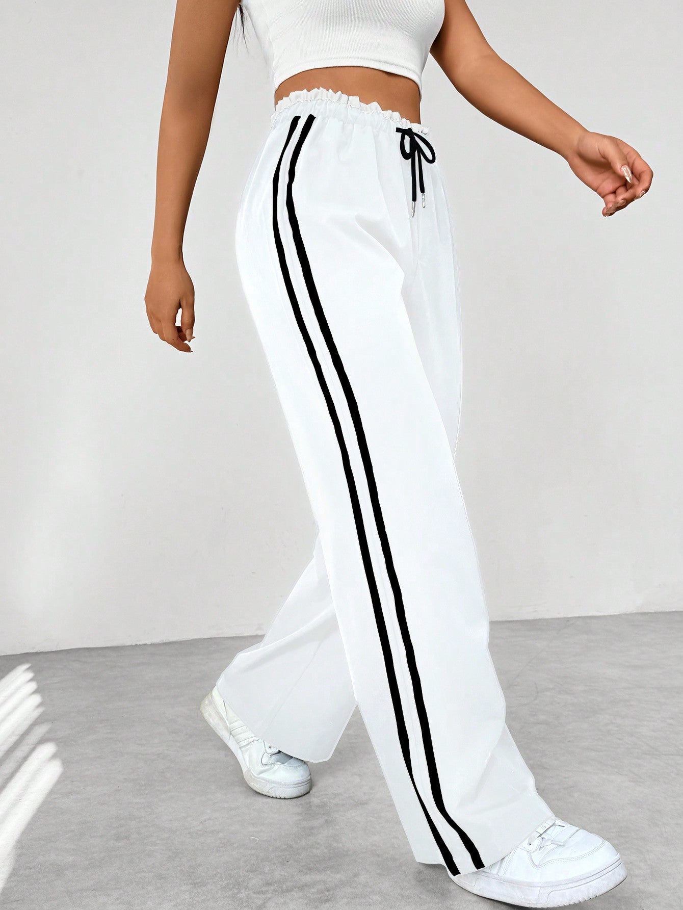 Pantaloni casual da donna a vita alta con strisce laterali e gamba larga | Taglio ampio