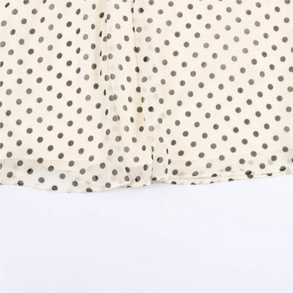 Blusa da donna a pois con collo alto, maniche lunghe e taglio ampio | Pois
