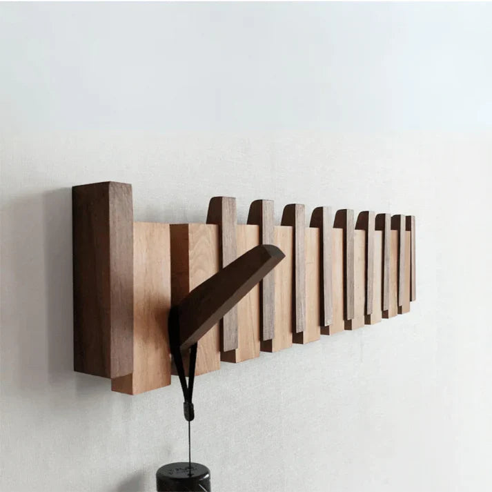 Stilvoller Kleiderständer im Klavierdesign – elegante Organisation für Ihren Flur mit mehreren Haken und kompaktem Design.