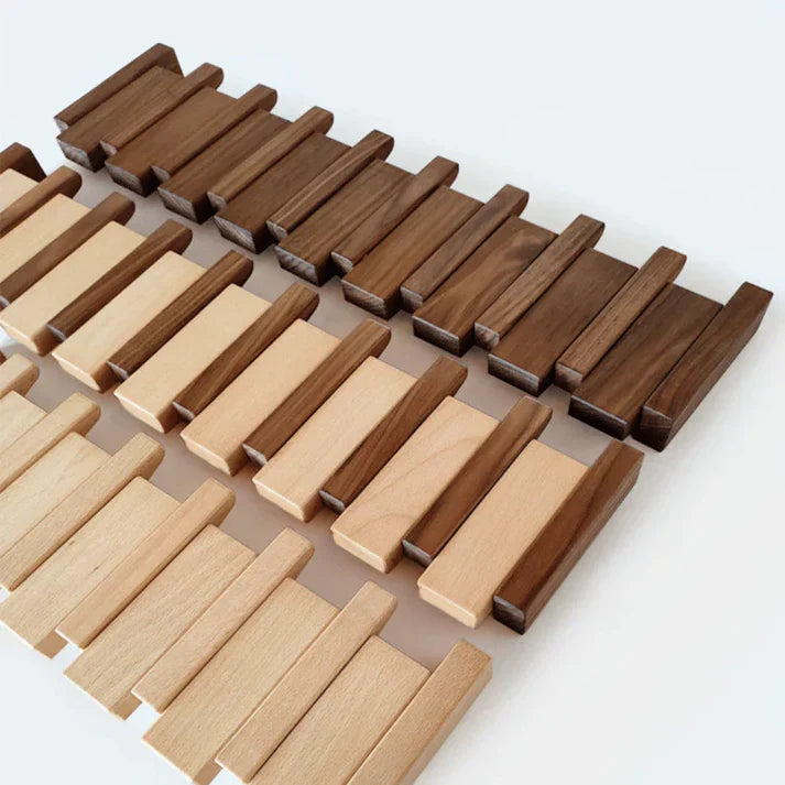 Stilvoller Kleiderständer im Klavierdesign – elegante Organisation für Ihren Flur mit mehreren Haken und kompaktem Design.
