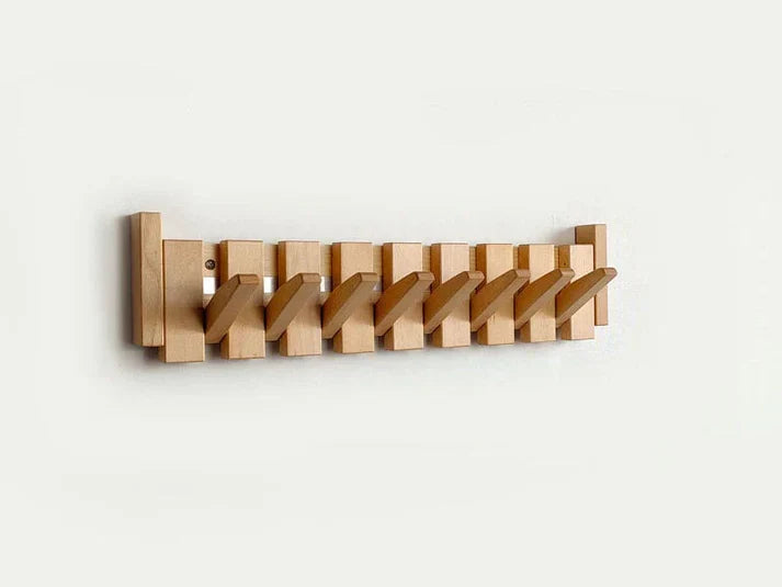 Stilvoller Kleiderständer im Klavierdesign – elegante Organisation für Ihren Flur mit mehreren Haken und kompaktem Design.