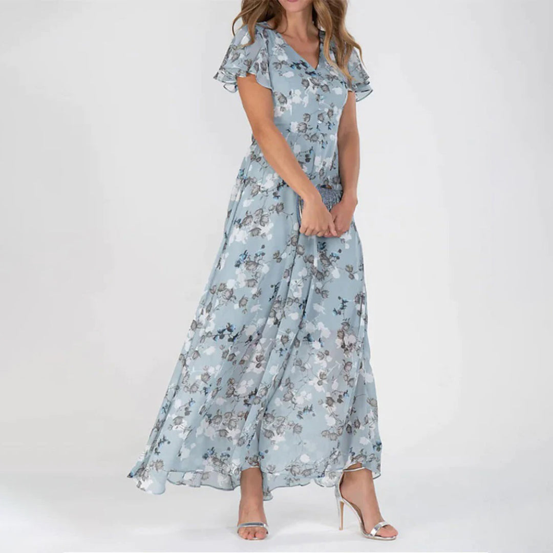 V-Ausschnitt und elegantes, modern geschnittenes, geblümtes Maxikleid
