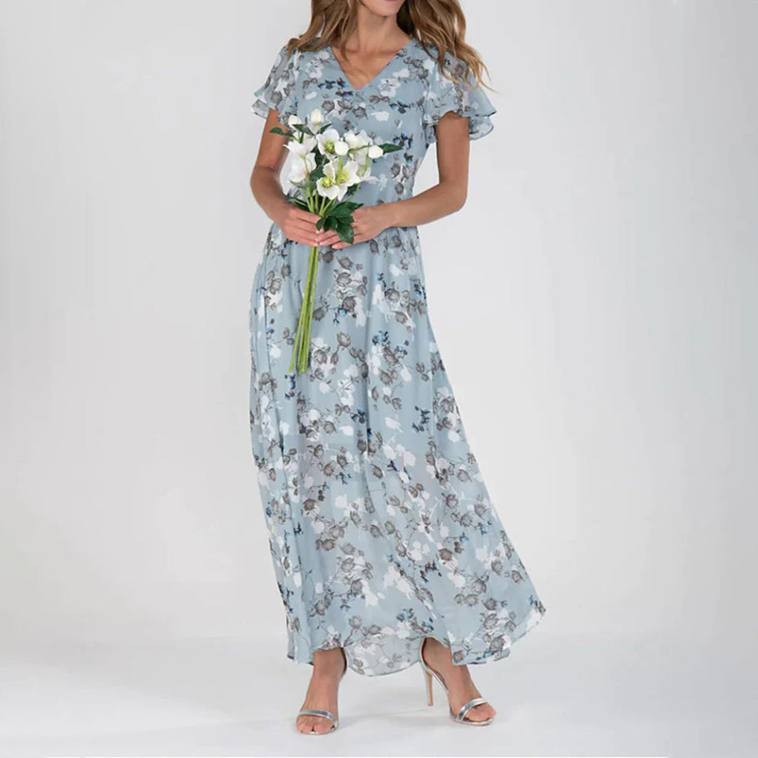 V-Ausschnitt und elegantes, modern geschnittenes, geblümtes Maxikleid